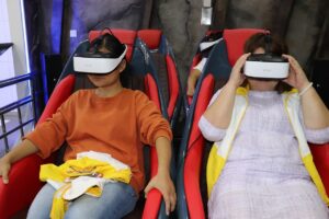 2 kids enjoying VR